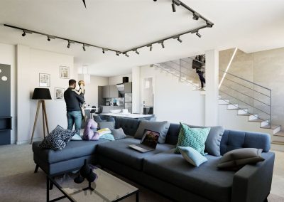 salotto openspace con scala che porta al primo piano